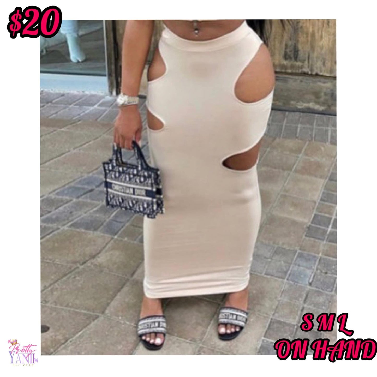 beige skirt features two peek-a-boo openings on either side, and its stretchy material