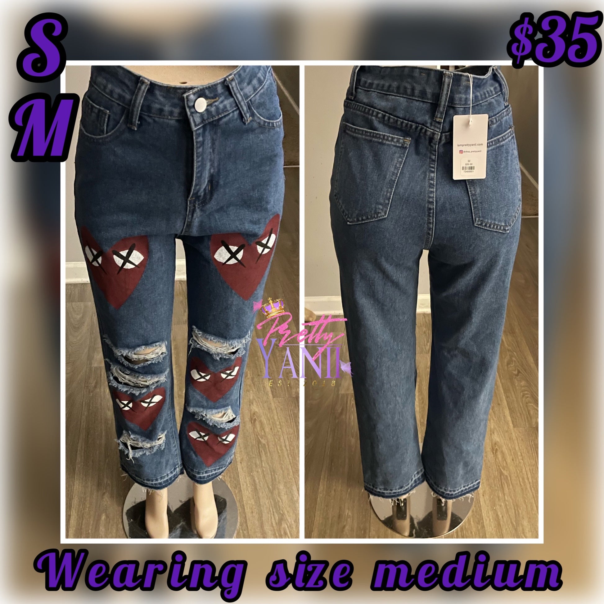 Petite-fit denim jeans with a charming red heart design