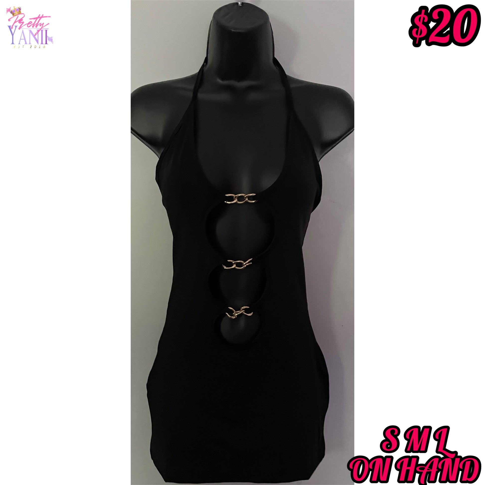 a halter neckline and a chain cut-out design, available in black