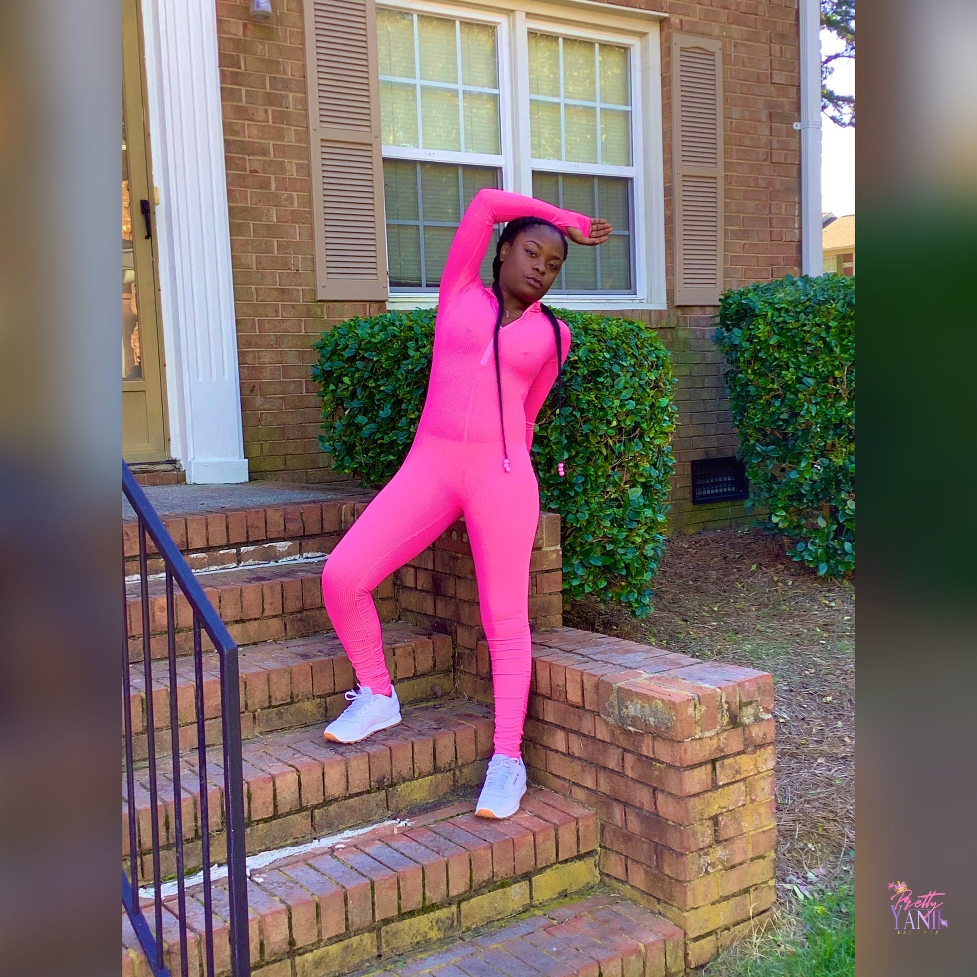 pink jumpsuit features a stretchy material that provides a snug fit