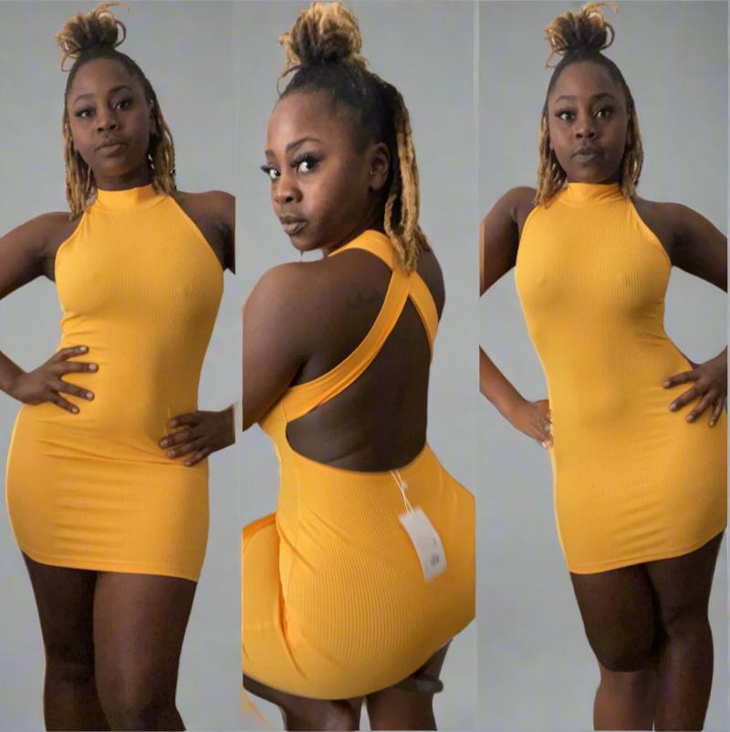 mustard-colored dress with a criss-cross back design and stretch fabric